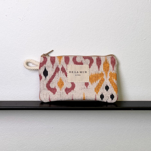 Monedero Petra, estampado en beige, negro, rojo, vista frontal — De La Mur