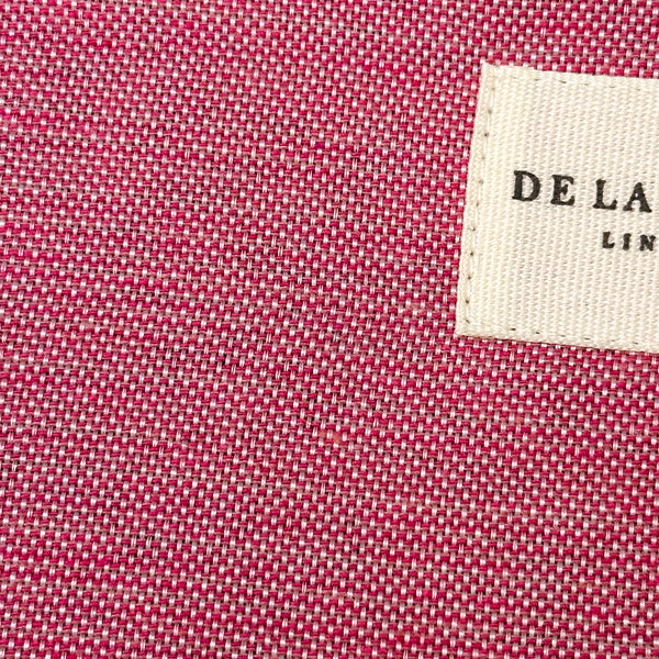 Monedero Fam, estampado en rojo, blanco, morado, detalle del material y el acabado — De La Mur