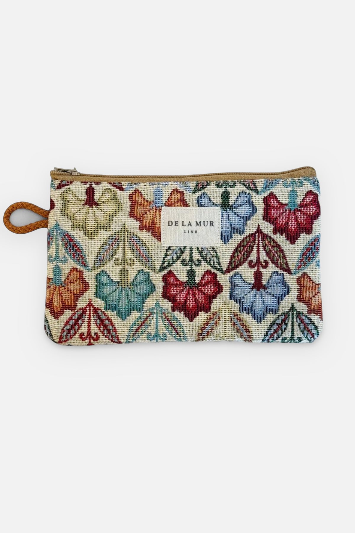 Monedero Flora, estampado floral en crema, rojo, azul y verde, vista frontal — De La Mur