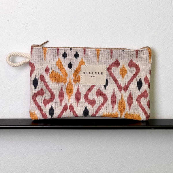 Monedero Petra, estampado en beige, negro, rojo, vista frontal — De La Mur