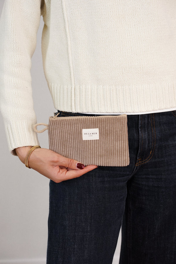 Monedero Toast, estampado en blanco, naranja, terracota, detalle del estampado y el material — De La Mur