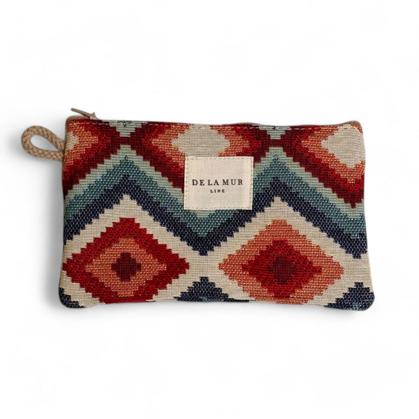 Monedero Yuc, estampado en rojo, beige, turquesa, vista frontal — De La Mur