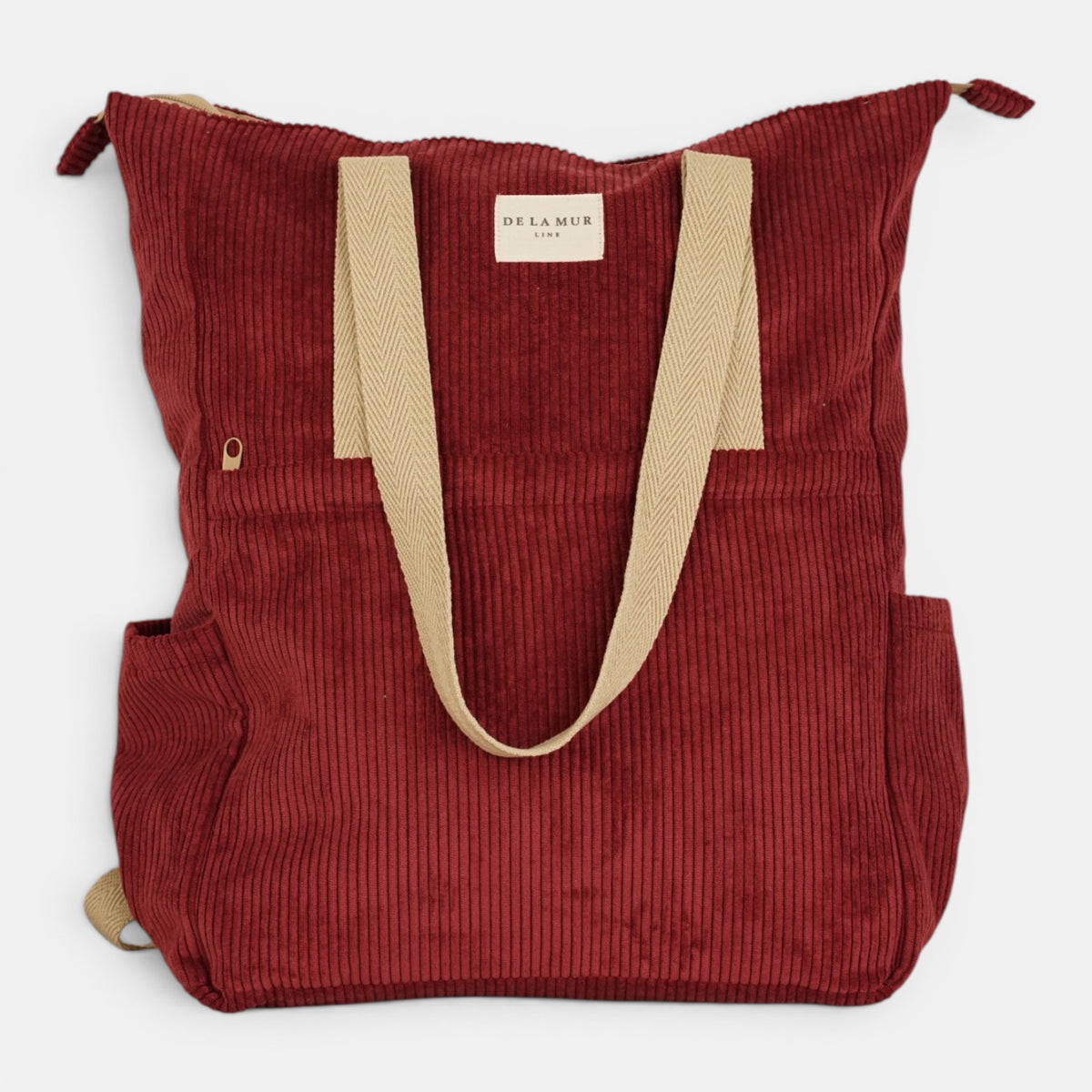 Bolso Arde, estampado en rojo, beige, blanco, detalle del estampado y el material — De La Mur