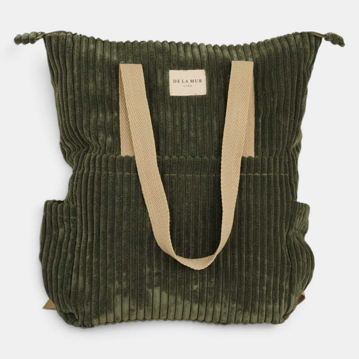 Bolso Musgo, acabado verde musgo, detalle del estampado y el material — De La Mur