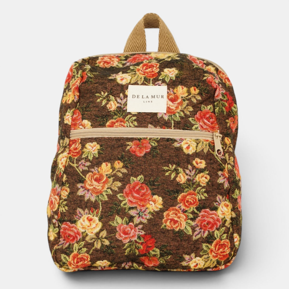 mochila Pepi, estampado en naranja, blanco, terracota, detalle del estampado y el material — De La Mur