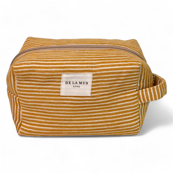 Neceser mediano Acel, estampado en naranja, beige, terracota, vista frontal — De La Mur