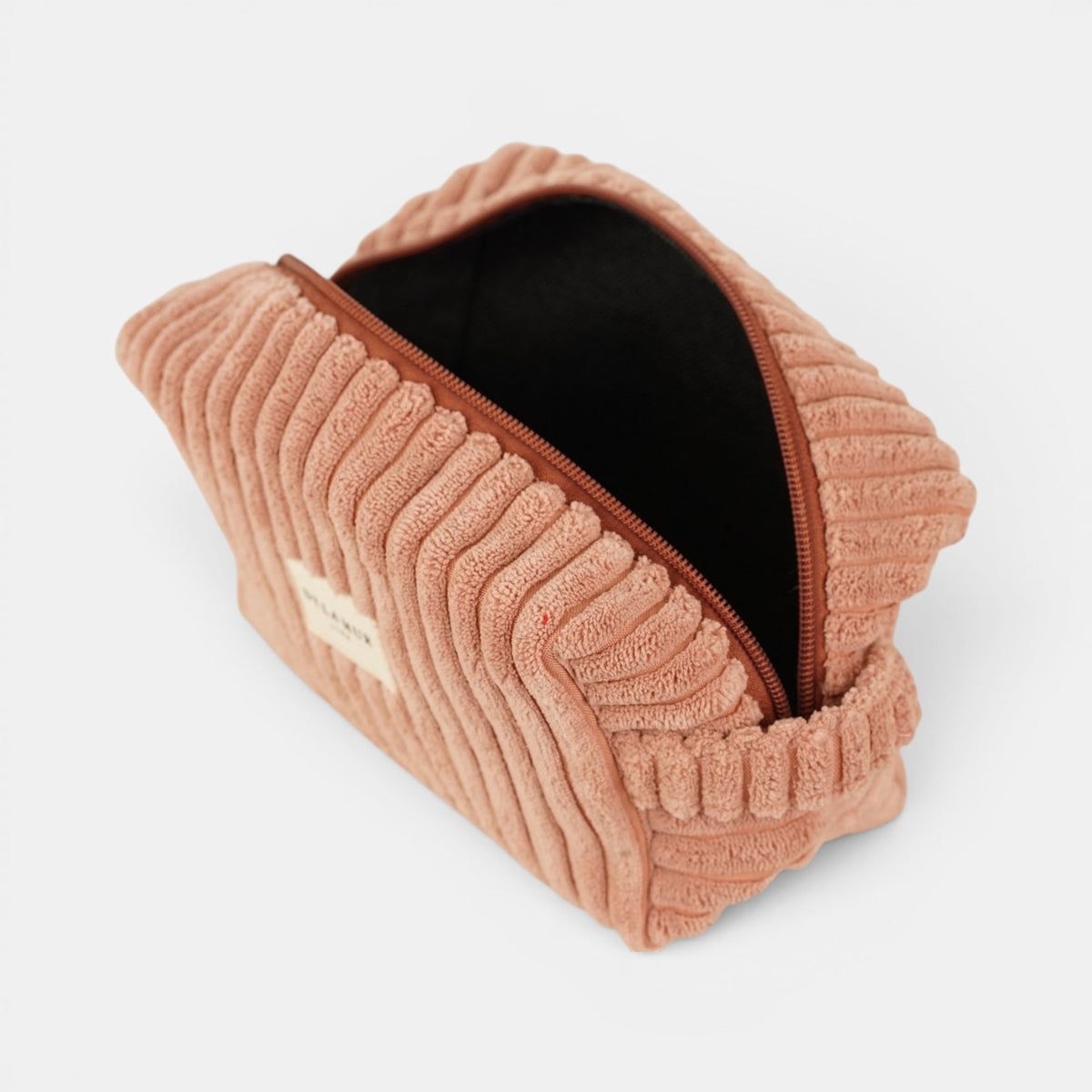 Neceser mediano Crepe, estampado en blanco, rojo, terracota, detalle del material y el acabado — De La Mur