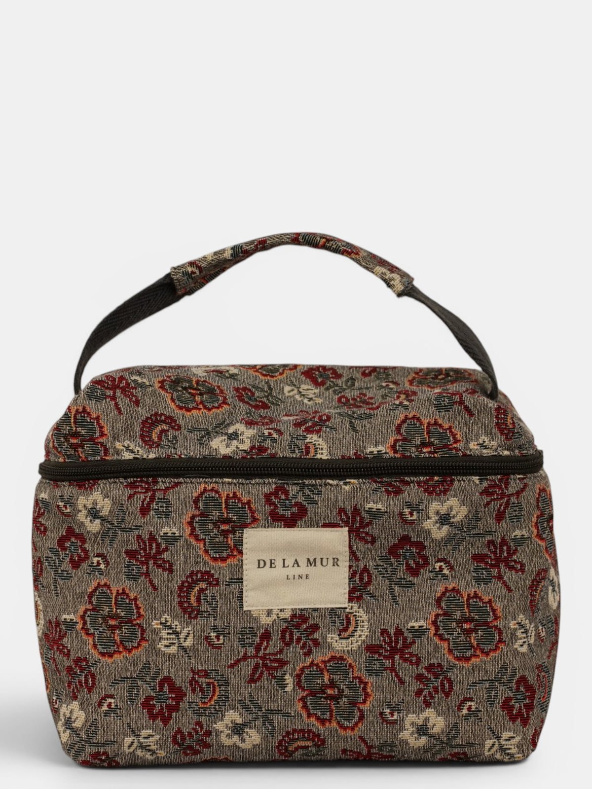 Neceser Nira, estampado en marrón, blanco, rojo, vista frontal — De La Mur