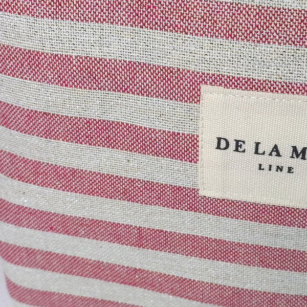 Neceser Rex, estampado en beige, rojo, morado, detalle del material y el acabado — De La Mur