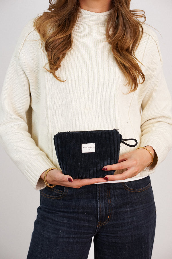 Neceser Curly, estampado en negro, blanco, detalle del material y el acabado — De La Mur