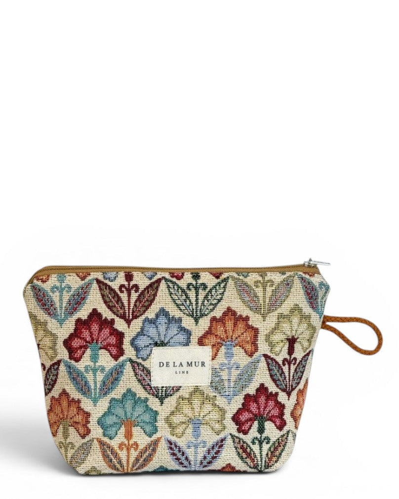 Neceser Flora, estampado floral en crema, rojo, azul y verde, vista frontal — De La Mur