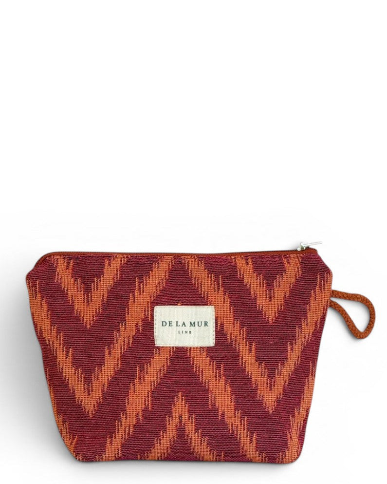Neceser Fuego, estampado en rojo, naranja y amarillo, vista frontal — De La Mur