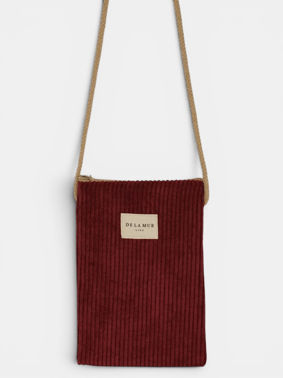Bolsito porta móvil Arde, estampado en rojo, blanco, beige, vista frontal — De La Mur