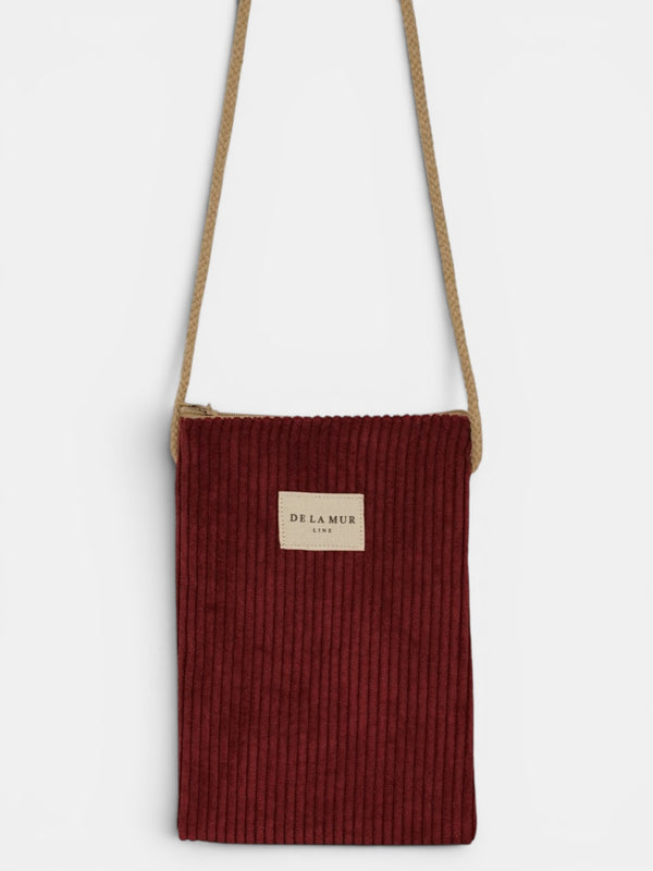 Bolsito porta móvil Arde, estampado en rojo, blanco, beige, vista frontal — De La Mur