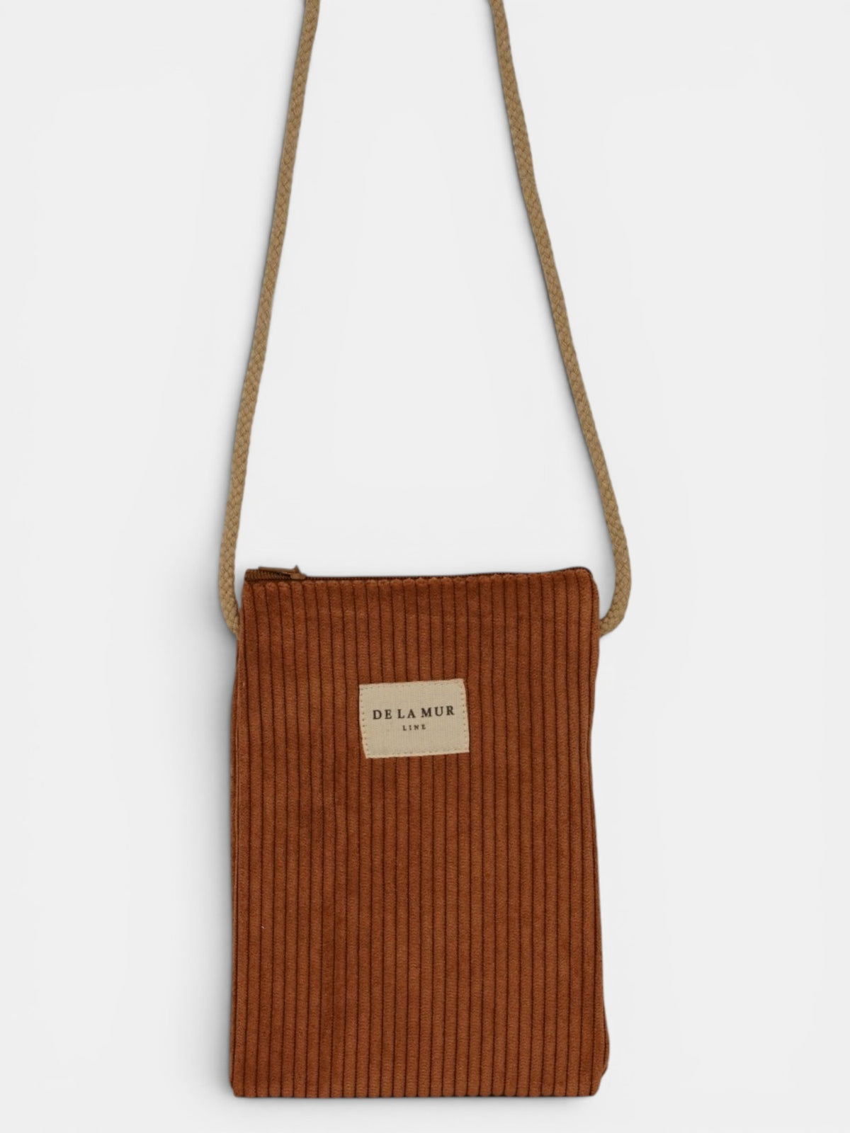 Bolsito porta móvil Barro, estampado en terracota, blanco, marrón, vista frontal — De La Mur
