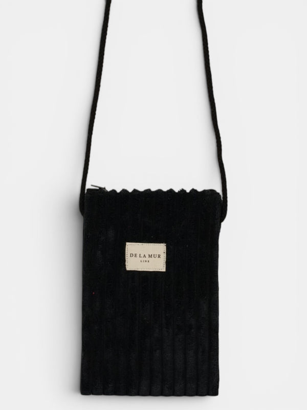 Bolsito porta móvil Curly, estampado en negro, blanco, vista frontal — De La Mur