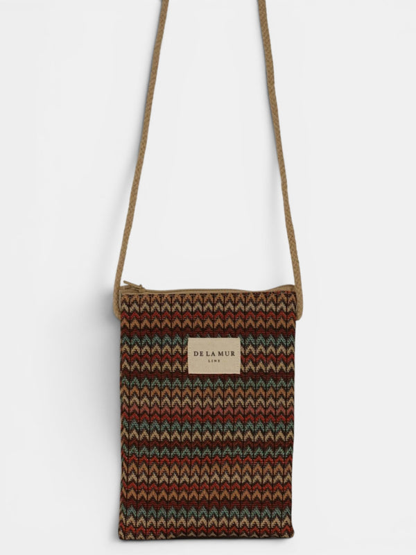 Bolsito porta móvil Fron, estampado en blanco, terracota, marrón, vista frontal — De La Mur