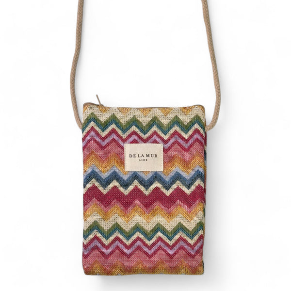 Mera phone bag, print in red, beige and orange, front view — De La Mur
