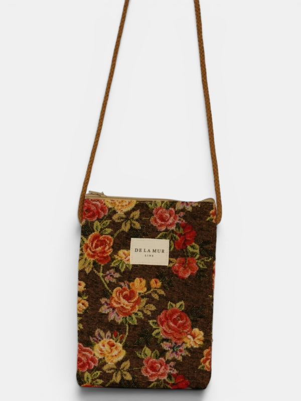 Bolsito porta móvil Pepi, estampado en blanco, naranja, terracota, vista frontal — De La Mur