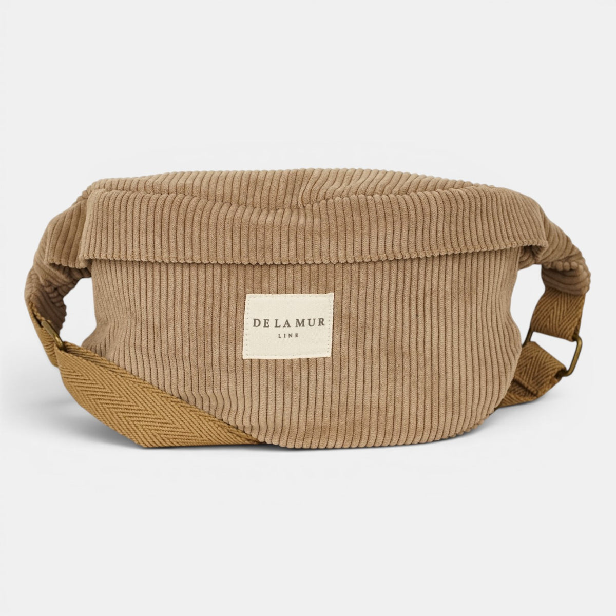 Riñonera Toast, estampado en rojo, beige, terracota, detalle del estampado y el material — De La Mur