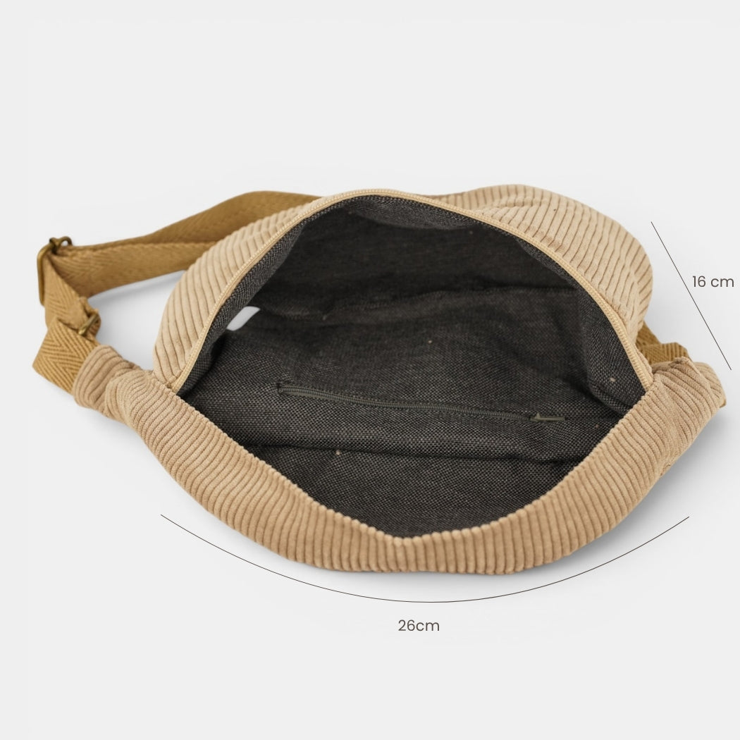 Riñonera Toast, estampado en rojo, beige, terracota, detalle del material y el acabado — De La Mur