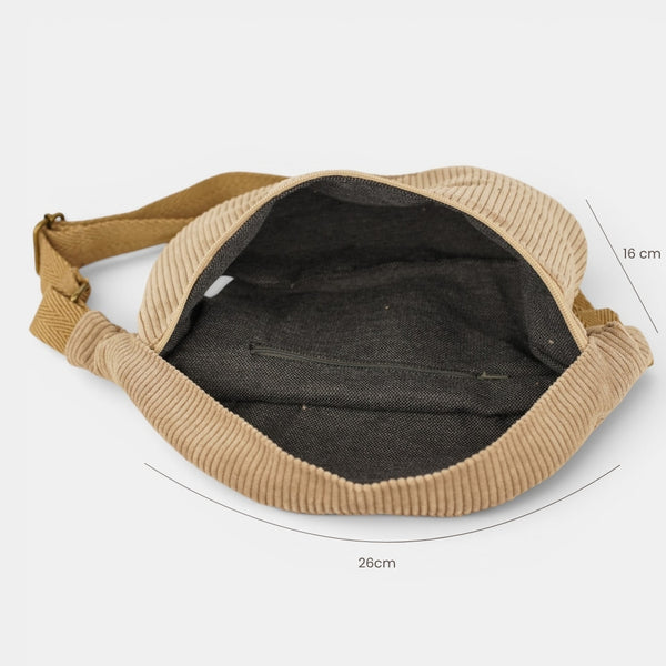 Riñonera Toast, estampado en rojo, beige, terracota, detalle del material y el acabado — De La Mur