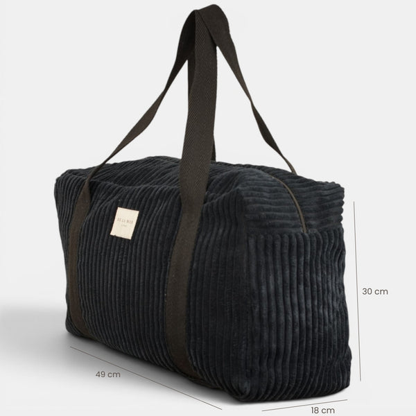 Bolso Curly, estampado en negro, azul, blanco, detalle del estampado y el material — De La Mur