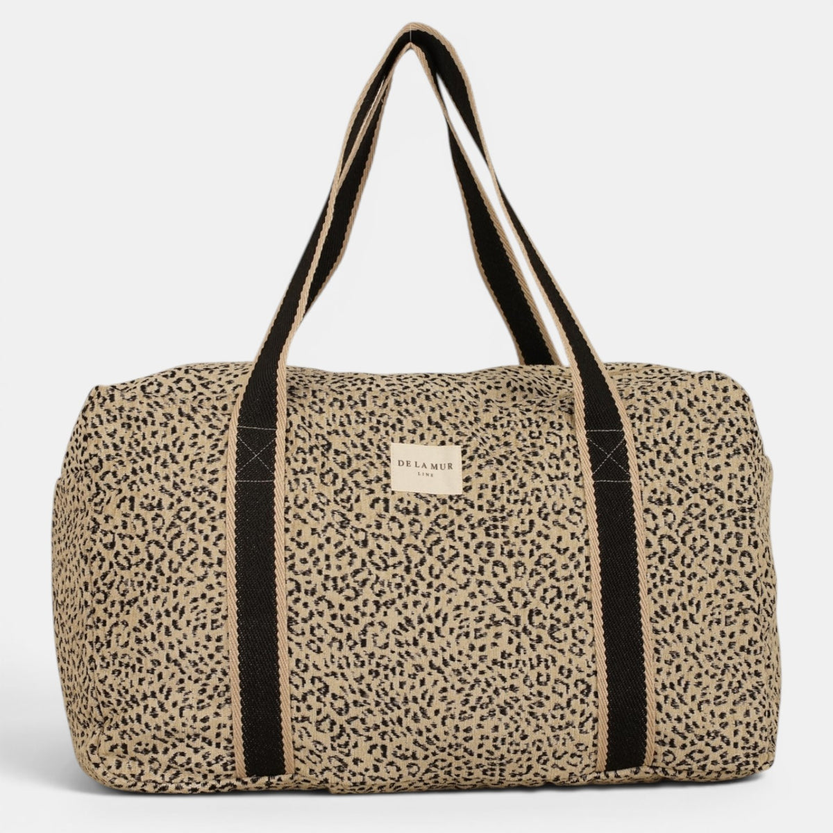Bolso Koto, estampado en negro, blanco, beige, vista en uso — De La Mur