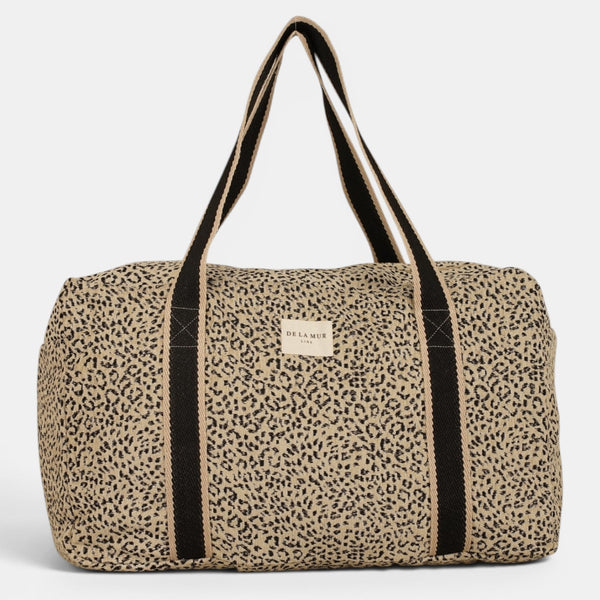 Bolso Koto, estampado en negro, blanco, beige, vista en uso — De La Mur