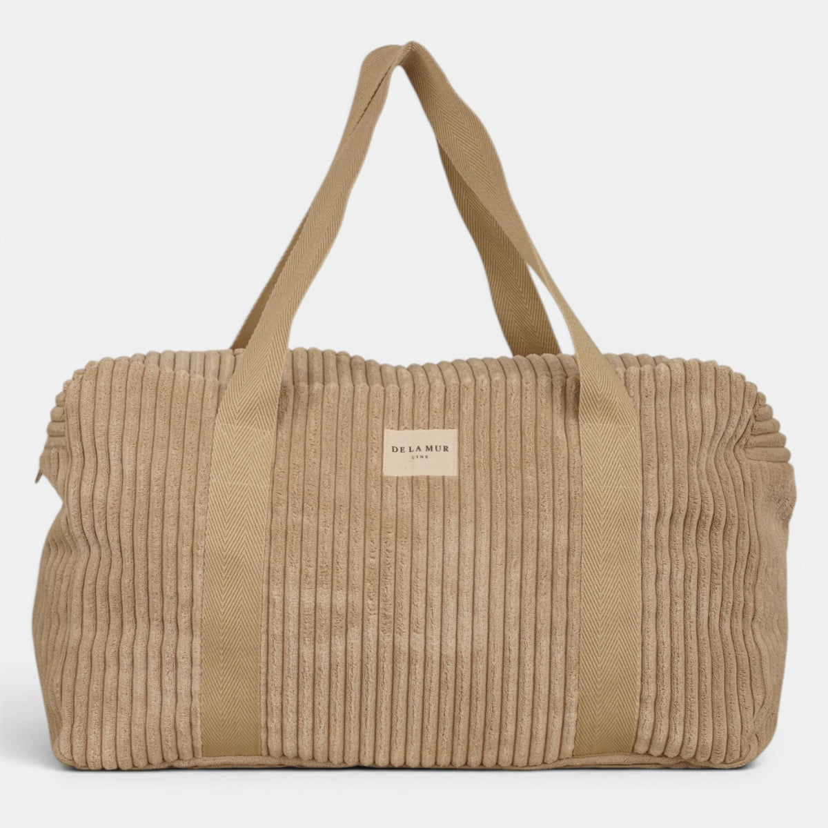 Bolso Moka, estampado en beige, terracota, blanco, detalle del material y el acabado — De La Mur