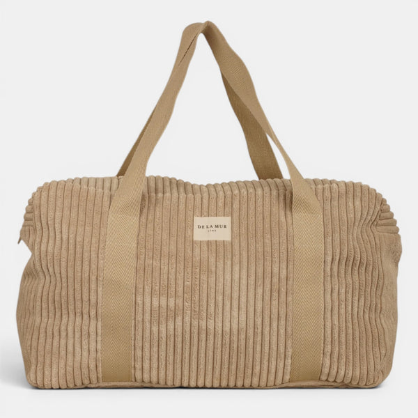 Bolso Moka, estampado en beige, terracota, blanco, detalle del material y el acabado — De La Mur