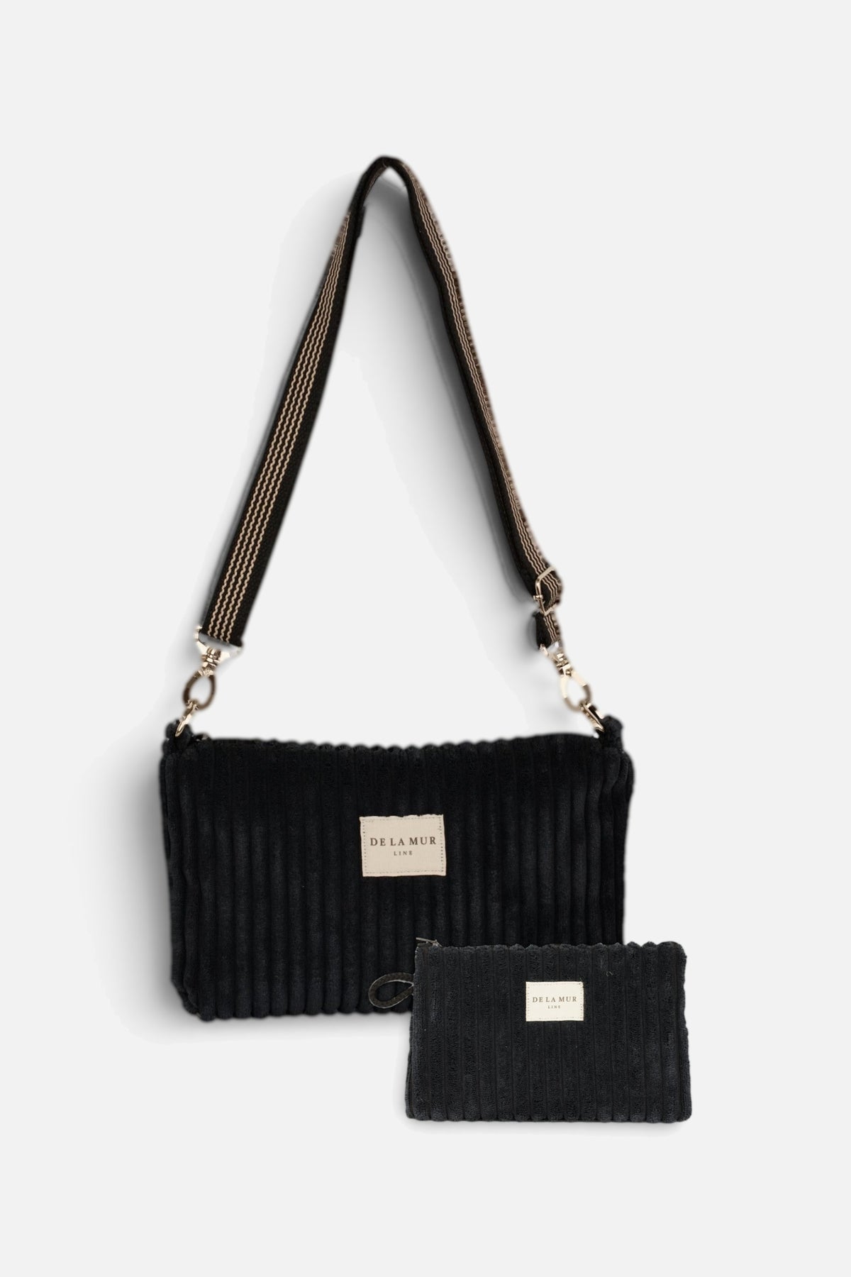 Pack bolso clutch y mini neceser de pana negra Curly